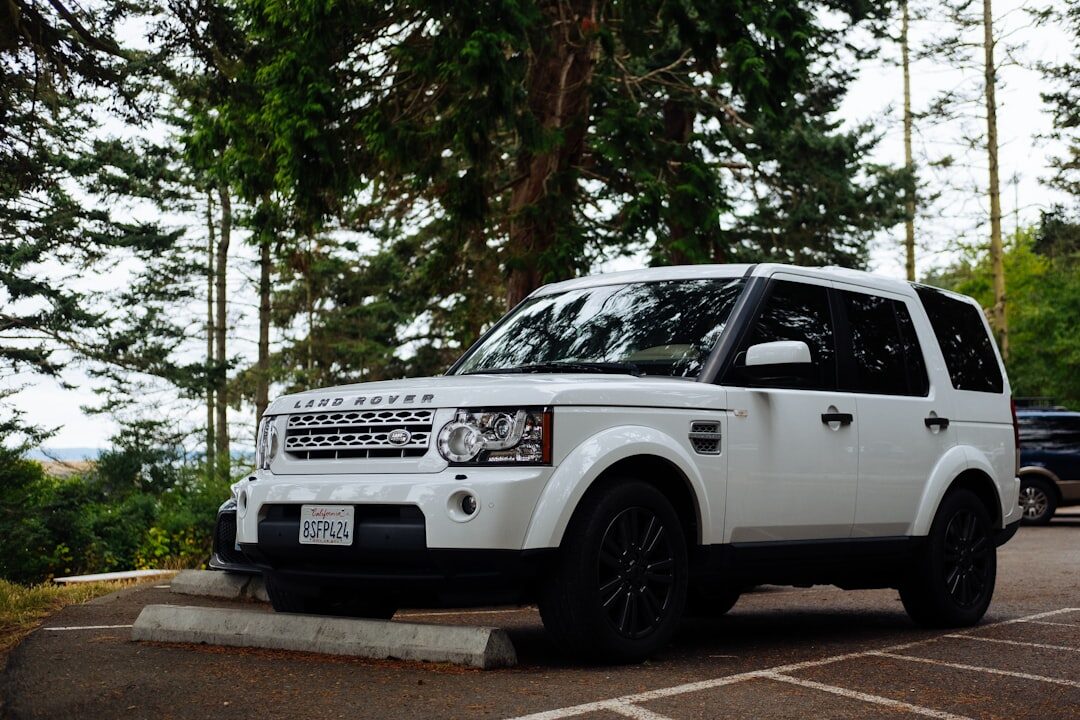 White premium SUV parked near the beach