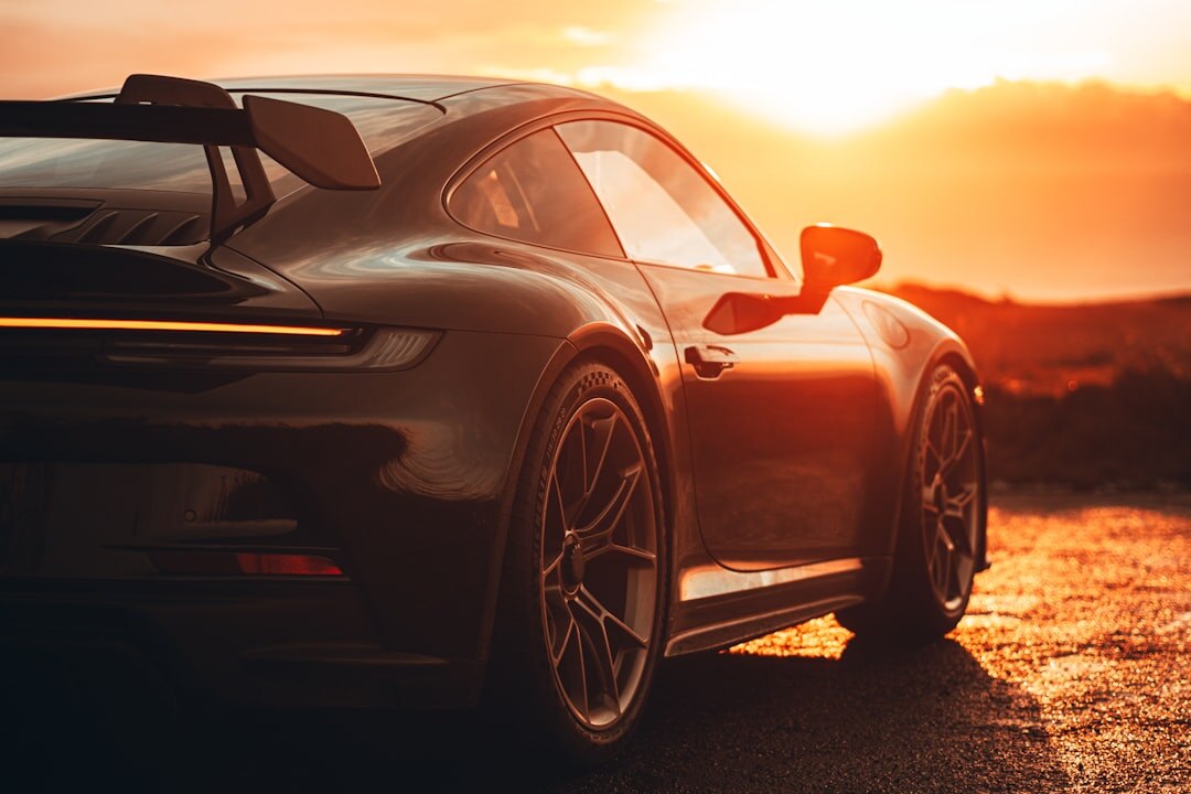 supercar parked at sunset